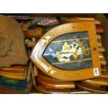 A LARGE QUANTITY OF REGIMENTAL AND OTHER BADGES MOUNTED ON WOODEN SHIELDS TOGETHER WITH THREE