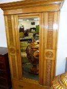 A VICTORIAN ASH WARDROBE WITH SINGLE MIRROR DOOR OVER DRAWERS AND PLINTH BASE. 106 x 59 x H.208cms.