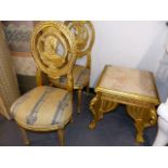 A PAIR OF EGYPTIAN STYLE GILTWOOD SIDE CHAIRS WITH PHAROAH ROUNDEL BACKS