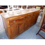 AN 18th.C.COUNTRY ELM AND FRUITWOOD DRESSER WITH FOUR FRIEZE DRAWERS OVER PANEL FRONT WITH TWO