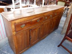 AN 18th.C.COUNTRY ELM AND FRUITWOOD DRESSER WITH FOUR FRIEZE DRAWERS OVER PANEL FRONT WITH TWO