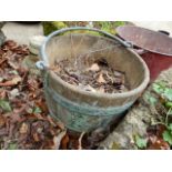 A COOPERED BUCKET AND A TWIN HANDLED TOLE FIRE BUCKET. (2)