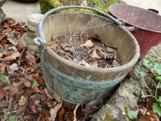 A COOPERED BUCKET AND A TWIN HANDLED TOLE FIRE BUCKET. (2)