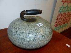 A VINTAGE GRANITE CURLING STONE.