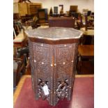 AN ANTIQUE MOORISH OCTAGONAL OCCASIONAL TABLE WITH CARVED AND INLAID DECORATION. 48 x 48 x H.63cms.