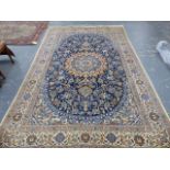 A PERSIAN CARPET OF CLASSIC DESIGN. 310 x 202cms.