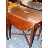 A MAHOGANY OVAL PEMBROKE TABLE CENTRALLY INLAID WITH AN OVAL PATERA WITHIN SATINWOOD CROSS