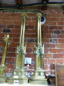 A PAIR OF NEOGOTHIC REVIVAL BRASS CLUSTER COLUMN LAMP BASES, EACH WITH TRIANGULAR ARCHED NICHES