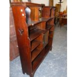 AN OAK BOOKCASE WITH SMALL CENTRAL GLAZED CABINET. 112 x 24 x H.129cms.