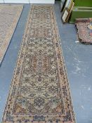 AN ORIENTAL RUNNER OF PERSIAN TABRIZ DESIGN. 353 x 79cms.