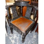 A 19th.C.CARVED CORNER CHAIR WITH NAVAL MOTIFS.