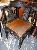 A 19th.C.CARVED CORNER CHAIR WITH NAVAL MOTIFS.