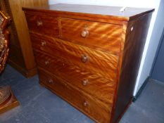 A VICTORIAN SATINBIRCH CHEST OF TWO SHORT AND THREE LONG DRAWERS ON SQUAT BUN FEET. 106 x 47 x H.