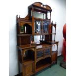 A LATE VICTORIAN BEVEL GLAZED ROSEWOOD SIDE CABINET, MIRROR BACKED SHELVES AROUND THE CUPBOARD