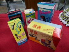 A GROUP OF FIVE CHINESE CLOCKWORK TINPLATE TOYS ALL BOXED.INC. MUSIC CART,PENGUIN, SPARROW, ROBOT-