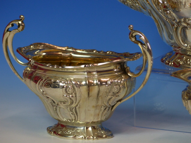 A BATCHELOR'S SILVER THREE PIECE TEASET BY B B, B'HAM 1900 AND 1901, THE FLUTED BODIES WORKED WITH - Image 14 of 18
