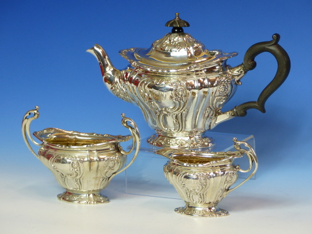 A BATCHELOR'S SILVER THREE PIECE TEASET BY B B, B'HAM 1900 AND 1901, THE FLUTED BODIES WORKED WITH - Image 4 of 18