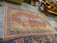 AN ANTIQUE TURKISH CARPET. 320 x 214cms.