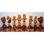 ATTRIBUTED TO WERNER LUX, A BALTIC AMBER CHESS SET IN AMBER CHESSBOARD BOX, THE QUEENS H.9.5cms.