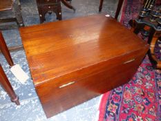 A TEAK TRUNK, THE TOP OF THE RECTANGULAR HINGED LID ONCE PAINTED WITH THE OWNER'S NAME. 68.5 x 47