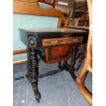 A VICTORIAN AESTHETIC EBONISED AND BURRWOOD WORK TABLE WITH FITTED WRITING INTERIOR OVER SEWING TRAY