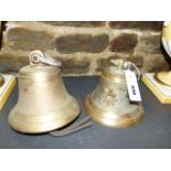 TWO BELLS, ONE BEARING THE INSIGNIA THE ROYAL ARMY SERVICE CORPS, LACKING IT'S CLAPPER. (2)