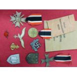 WAR MERIT CROSS WITH SWORDS, WAR MERIT CROSS AND WAR MERIT MEDAL, TWO WITH ENVELOPES, THREE ALLOY
