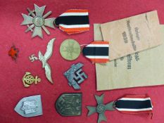 WAR MERIT CROSS WITH SWORDS, WAR MERIT CROSS AND WAR MERIT MEDAL, TWO WITH ENVELOPES, THREE ALLOY