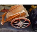 A RUSTIC SCRATCH BUILT MODEL OF A HORSE DRAWN HAY CART.