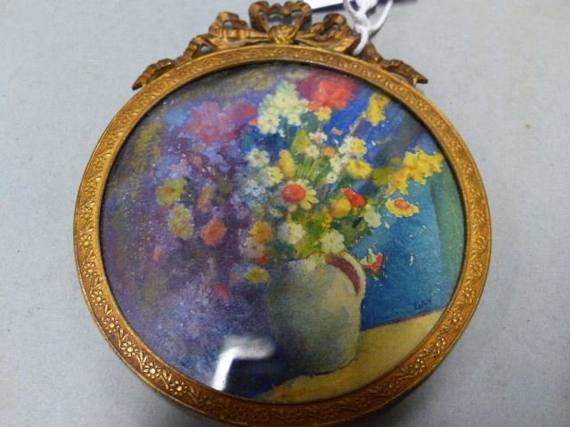DAY, A MINIATURE WATERCOLOUR OF A JUG OF FLOWERS, WITHIN RIBBON TOPPED GILT METAL FRAME. Dia.8.