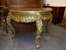 A GILTWOOD DEMI LUNE TABLE, CABRIOLE LEGS CARVED WITH ROSES AND FOLIAGE. 125 x 64 x H.80cms.