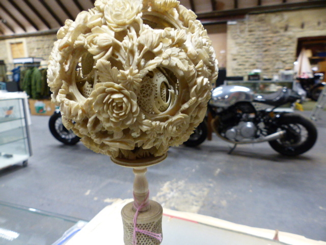 A CHINESE IVORY PUZZLE BALL CARVING WITH STAND HAVING A ROTATING RETICULATED KNOP AND A FURTHER - Image 9 of 20