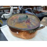 A LARGE ANTIQUE COPPER TWIN HANDLED TURBOT PAN WITH COVER.