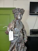 A BRONZE FIGURE OF PIERRE 1, THE RUSSIAN TSAR STANDING HOLDING A BOOK. H.71cms.