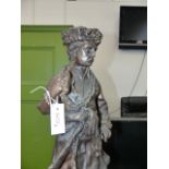 A BRONZE FIGURE OF PIERRE 1, THE RUSSIAN TSAR STANDING HOLDING A BOOK. H.71cms.