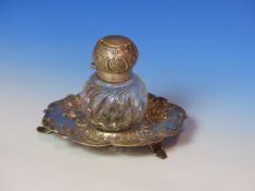 A VICTORIAN SILVER AND CUT GLASS INKWELL ON STAND DATED 1894 FOR JOHN GRINSELL AND SONS. WEIGHABLE