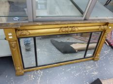 A THREE PLATE GILT FRAME MIRROR WITH REEDED EBONY STRAP DIVISIONS WITHIN AND BELOW HALF ROUND