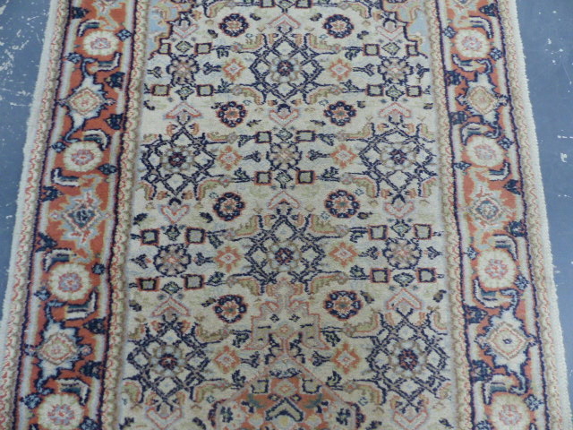 AN ORIENTAL RUNNER OF PERSIAN TABRIZ DESIGN. 332 x 79cms. - Image 6 of 8