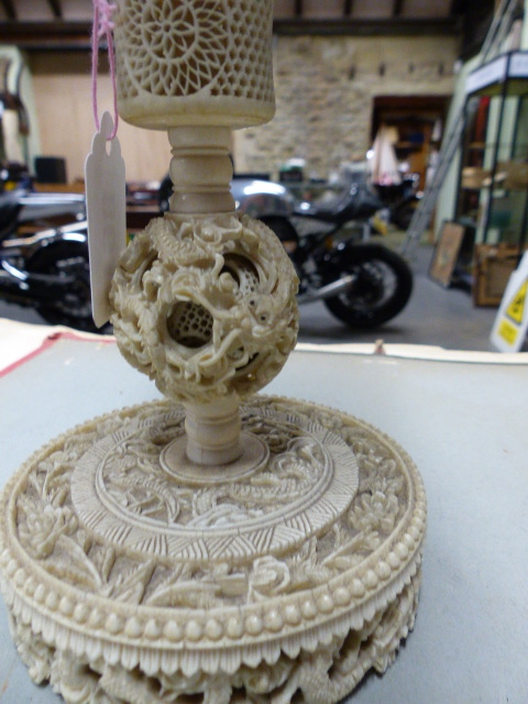 A CHINESE IVORY PUZZLE BALL CARVING WITH STAND HAVING A ROTATING RETICULATED KNOP AND A FURTHER - Image 10 of 20