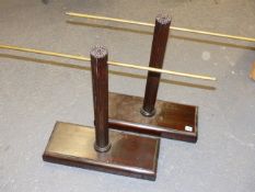 A PAIR OF MAHOGANY AND BRASS DISPLAY STANDS. (2)