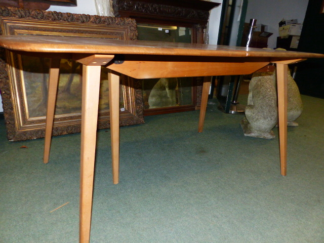 AN ERCOL PALE ELM EXTENDING DINING TABLE WITH TWO LEAVES TOGETHER WITH A SET OF EIGHT ERCOL STICK - Image 3 of 5