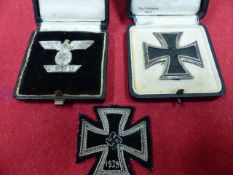THIRD REICH IRON CROSS 1ST CLASS, BOXED, BOXED BAR TO SAME AND A CLOTH EXAMPLE. (3)