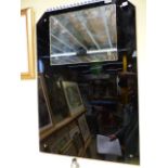 A PAIR OF ART DECO BLACK GLASS BATHROOM MIRRORS. 56 x 84cms.