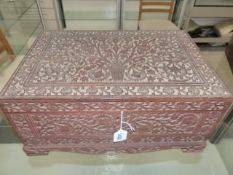 AN ANGLO INDIAN ELABORATELY CARVED HARDWOOD WORK BOX WITH LIFT TOP AND MIRROR BACK ENCLOSING