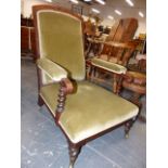 A VICTORIAN OAK SHOW FRAME ARMCHAIR UPHOLSTERED IN PALE OLIVE VELVET, THE FRONT ARM SUPPORTS BARLEY