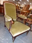 A VICTORIAN OAK SHOW FRAME ARMCHAIR UPHOLSTERED IN PALE OLIVE VELVET, THE FRONT ARM SUPPORTS BARLEY