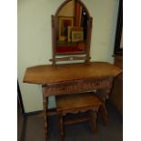 A GOOD ARTS AND CRAFTS CARVED AND LIMED OAK AND PAINT DECORATED BEDROOM SUITE COMPRISING A WARDROBE,