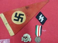 SS COLLAR TAB AND LARGE SS TYPE CAP BADGE AND AN ITALIAN AND GERMAN AFRICA CAMPAIGN MEDAL AND A