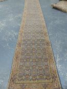 AN ORIENTAL RUNNER OF PERSIAN TABRIZ DESIGN. 433 x 80cms.