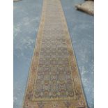 AN ORIENTAL RUNNER OF PERSIAN TABRIZ DESIGN. 433 x 80cms.